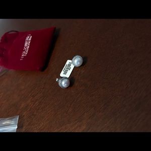 pearl earrings with a diamond outline